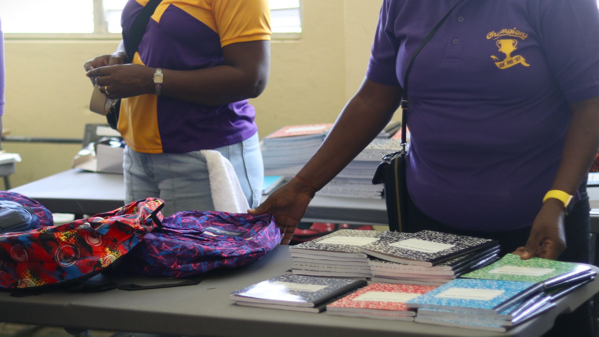 Volunteers distributing bags