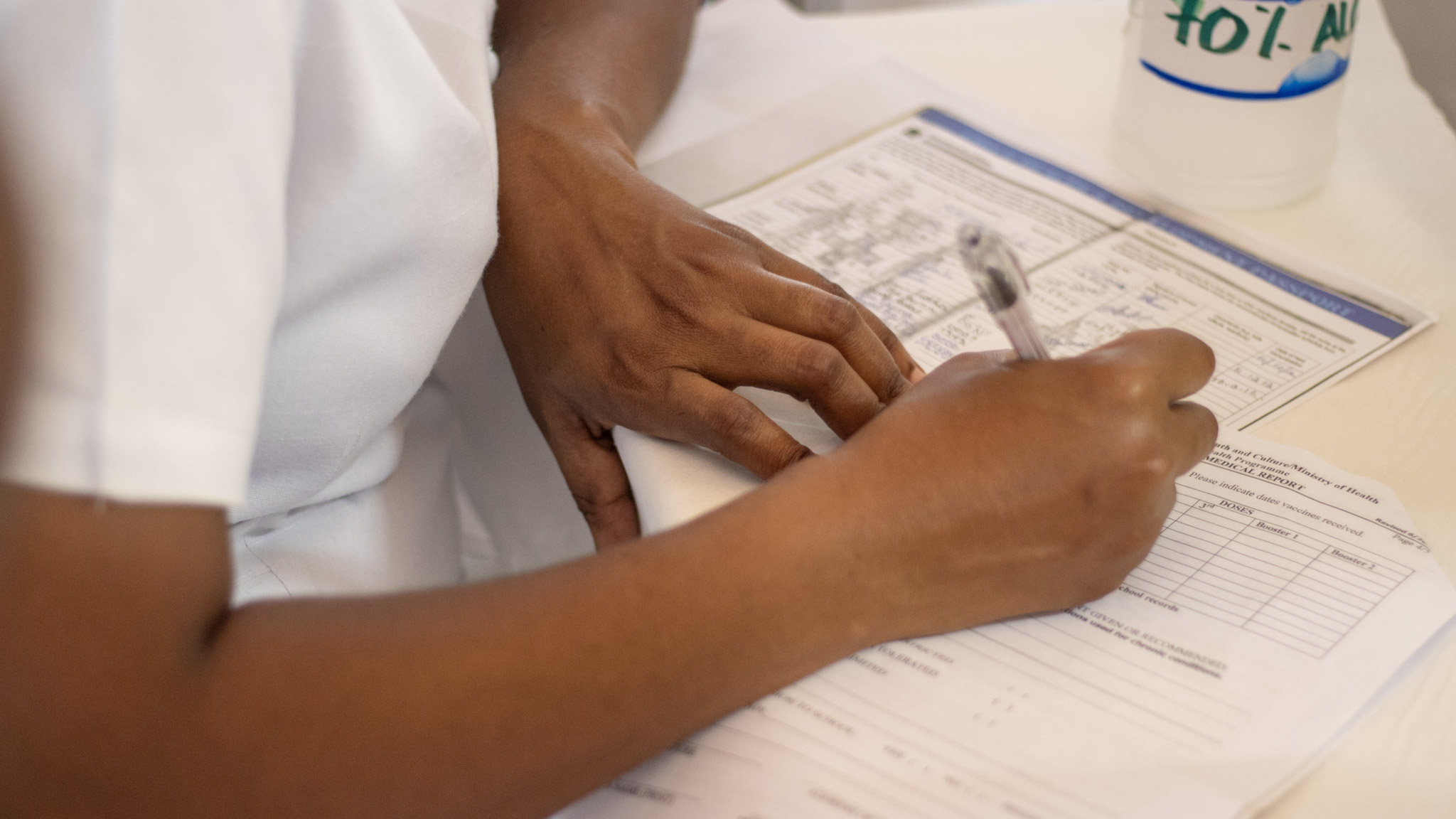 Medical forms being filled out